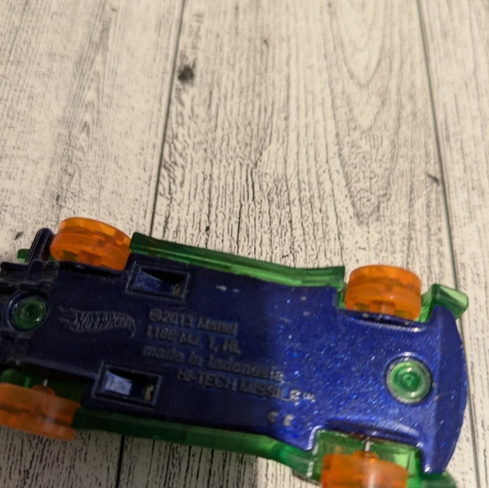 hot Wheels Green Transparent Racing Car Toy with Orange Accents - Kids ehicles
